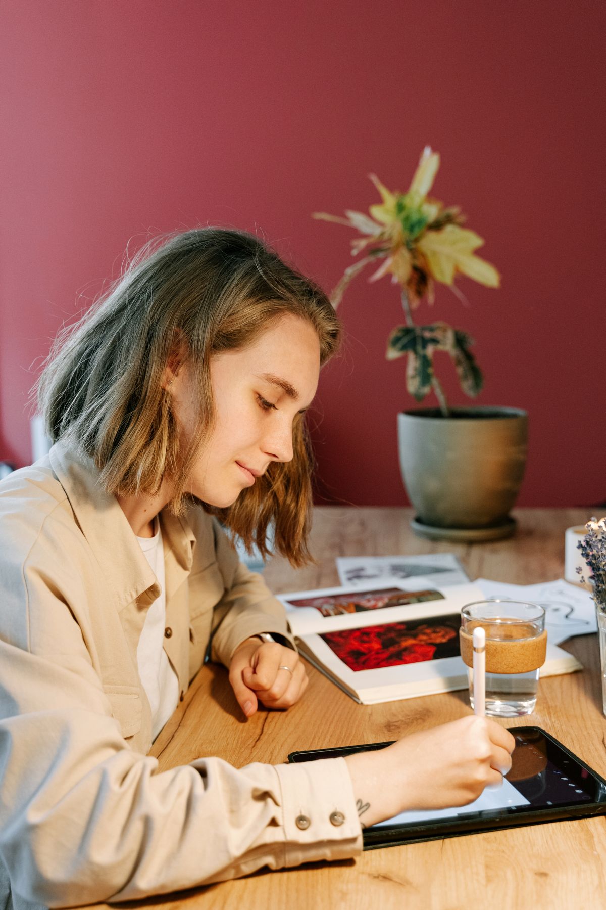 Designer sketching artwork on a tablet